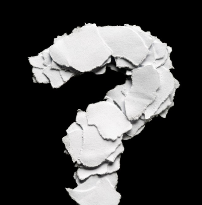 Question mark made of torn paper